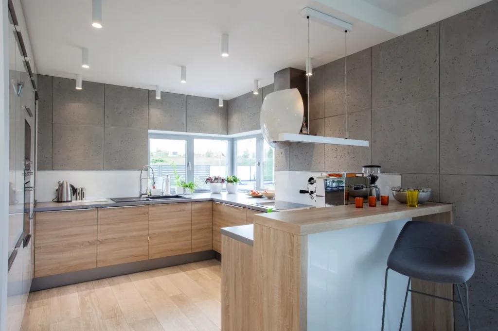 Living room wall in architectural concrete concreAte common standard dimensions 60x60 — Prywatny apartament / Łuków